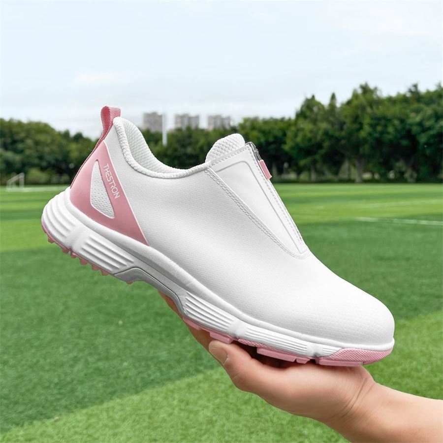 Women's Zip Slip-On Spikeless Golf Shoe on the golf course, view 6