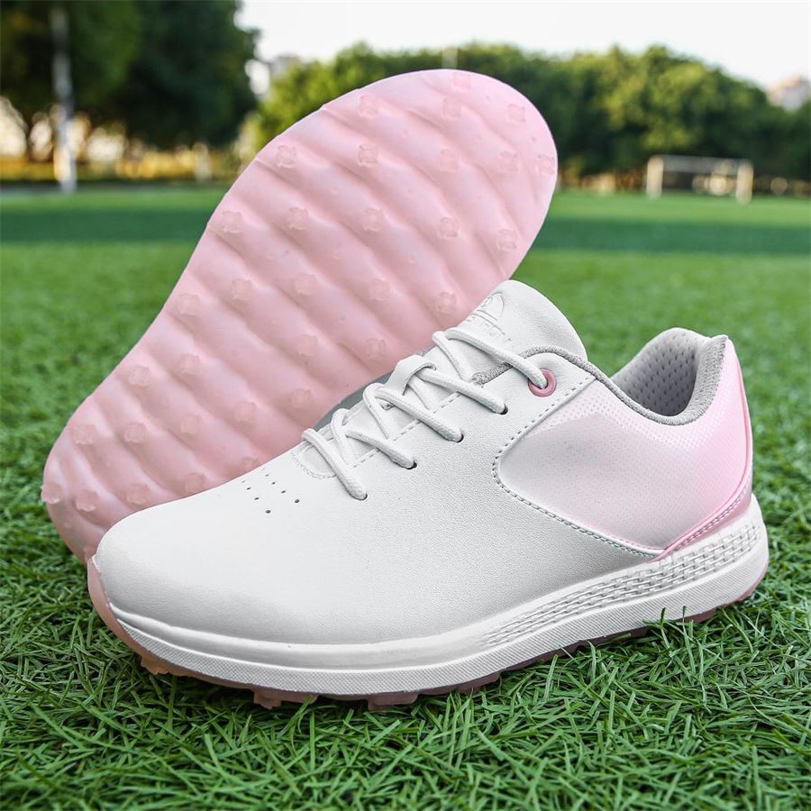 Women's Gradient Spikeless Golf Shoe on the golf course, view 1