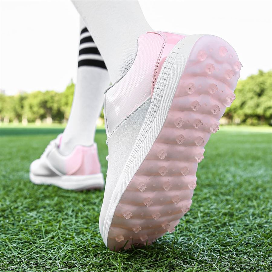 Women's Gradient Spikeless Golf Shoe on the golf course, view 6