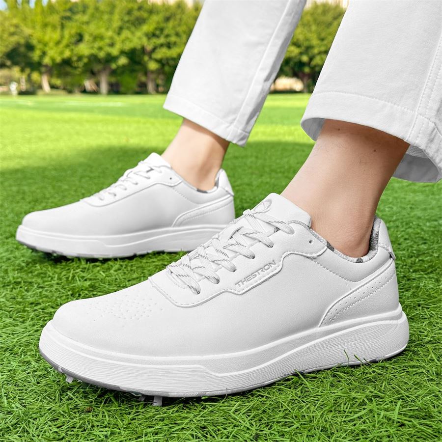 Court-Style Spiked Golf Shoe on the golf course, view 1