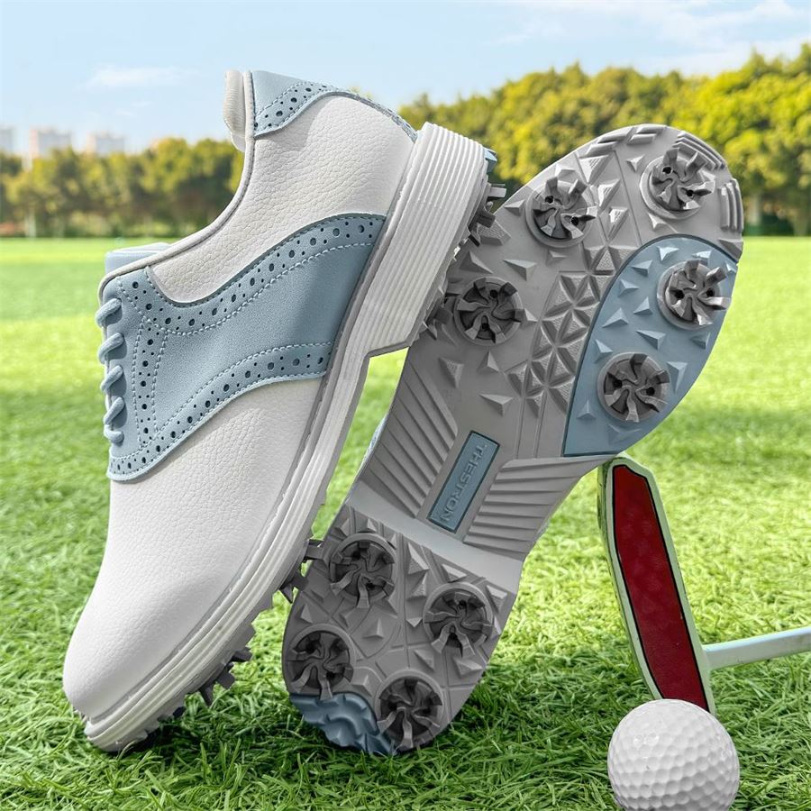 Women's Saddle Spiked Golf Shoe on the golf course, view 3